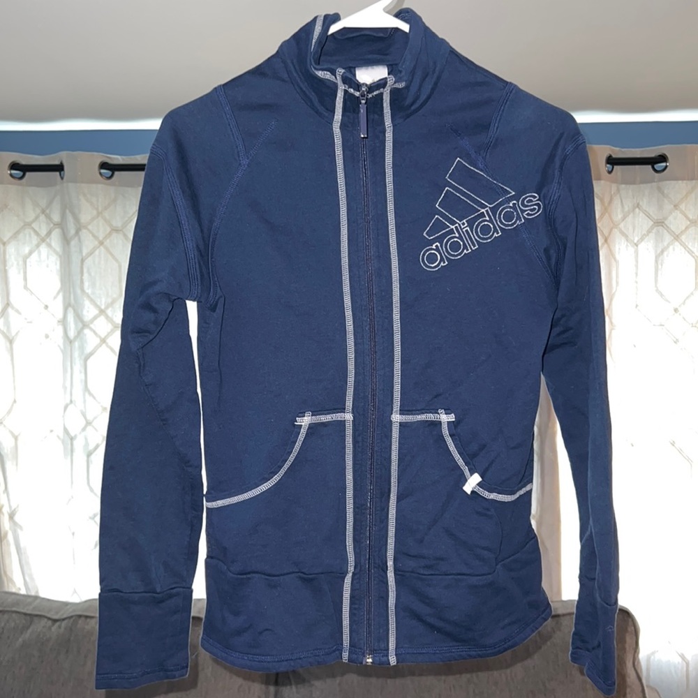 Navy Adidas zip up jacket. Lightly worn, no holes or stains.